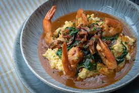 Napa Cafe signature dishes Pan Seared Scallops, Shrimp & Grits, Filet Mignon, Double Stout Braised Short Ribs, Blackened Shrimp Dumplings, Gouda Risotto